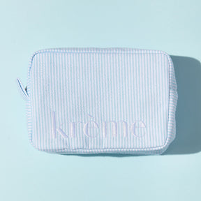 Vanity bleu rayé brodé blanc